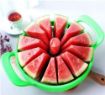 Picture of Stainless Steel Fruit cutter Vegetable and Melon Divider Slicer kitchenware Stainless Steel Watermelon Slicer Cutter Large Round Stainless Steel Cutter Plastic Slicer for Cutting Watermelon