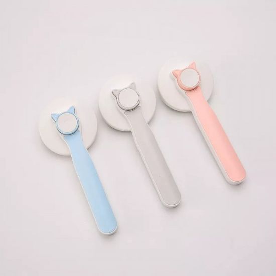 Picture of PET CLEANING COMB BRUSH