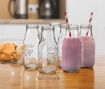 Picture of Glass Milk Bottles with Reusable Airtight Metal Twist Lids and Straw MILK GLASS