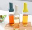 Picture of Auto Flip Glass Oil Bottles Automatic Opening And Closing Olive Oil Seasoning Oil Dispenser Bottle Automatic Leakproof with Drip Free Cap olive Oil Bottles for Kitchen Baking