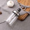 Picture of Glass Jar With Spoon  storage jar air tight jars and containers seasoning jar oil jar with spoon food storage jar honey dispenser in glass dining table jar set multipurpose jar for kitchen oil jar with spoon oil bottle with spoon
